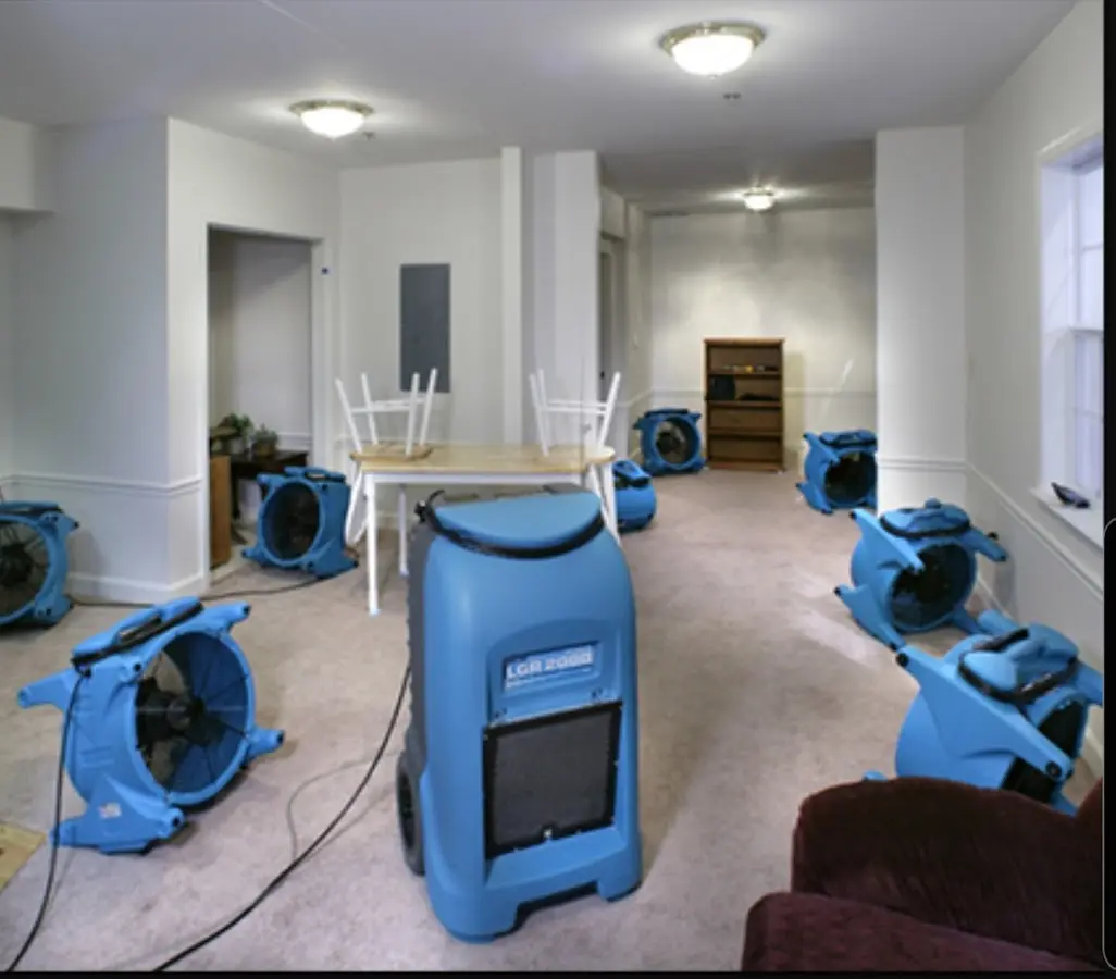 Air movers and dehumidifier setup for Water Damage Restoration in Windsor